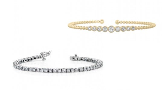 a white gold diamond tennis bracelet and a yellow gold diamond cuff bracelet