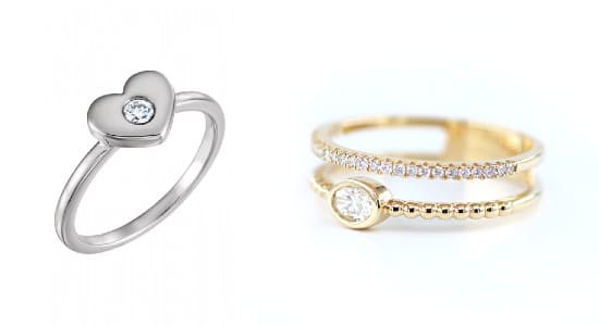 a white gold heart motif ring with a diamond next to a double banded, yellow gold diamond ring
