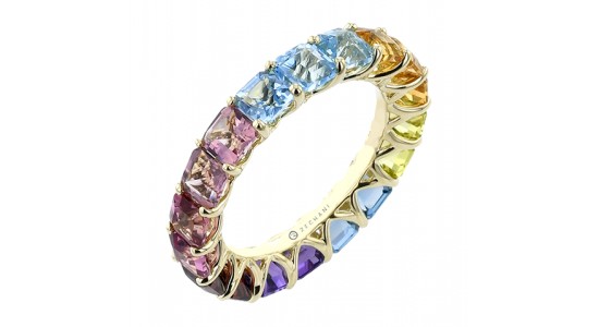 a yellow gold stackable fashion ring with different colored gemstones