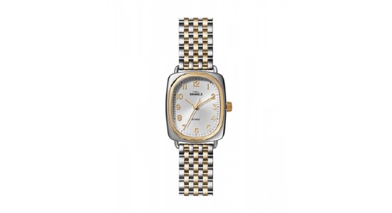 a mixed metal ladies’ watch by Shinola with a rectangular case