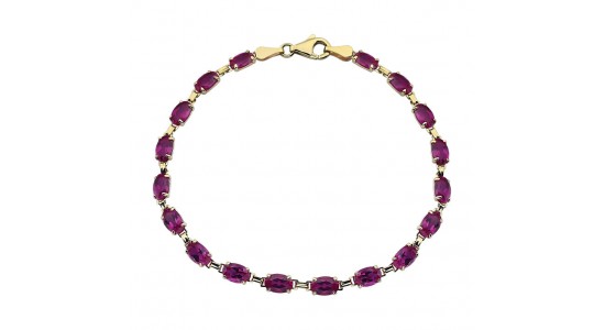 a yellow gold line bracelet featuring oval cut rubies