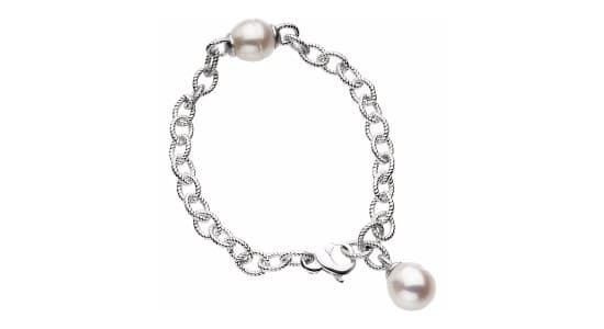 a textured chain bracelet featuring two pearls by Stuller